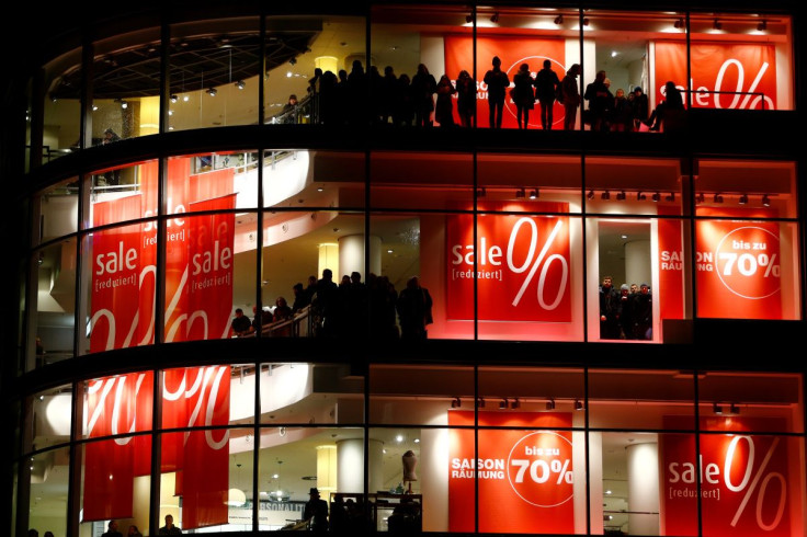 Customers and employees of a shopping mall watch the demonstrations of supporters of the movement of Patriotic Europeans Against the Islamisation of the West (PEGIDA) and their opponents in Frankfurt, January 26, 2015.  