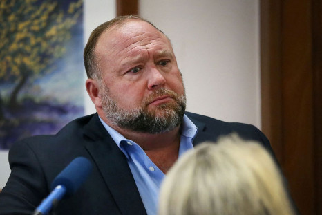 Alex Jones attempts to answer questions about his emails asked by Mark Bankston, lawyer for Neil Heslin and Scarlett Lewis, during trial at the Travis County Courthouse, Austin, Texas, U.S., August 3, 2022.  Briana Sanchez/Pool via 