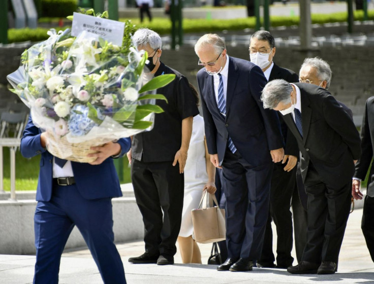 Russian Ambassador to Japan Mikhail Yurievich Galuzin and other officials visit Peace Memorial Park in Hiroshima, western Japan, August 4, 2022, ahead of the 77th anniversary of the atomic bombing of the city on August 6, 2022.  Mandatory credit Kyodo via