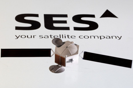 Satellite model is placed on SES logo in this picture illustration taken April 4, 2022. 