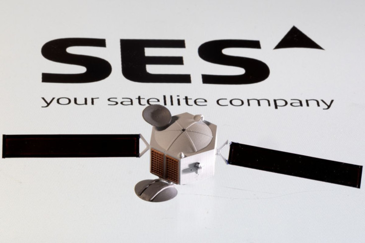 Satellite model is placed on SES logo in this picture illustration taken April 4, 2022.