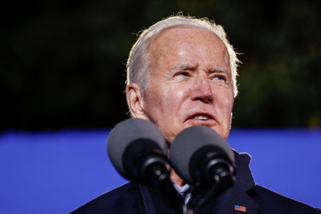 U.S. President Joe Biden campaigns for Democratic candidate for governor of Virginia Terry McAuliffe at a rally in Arlington, Virginia, U.S. October 26, 2021. 