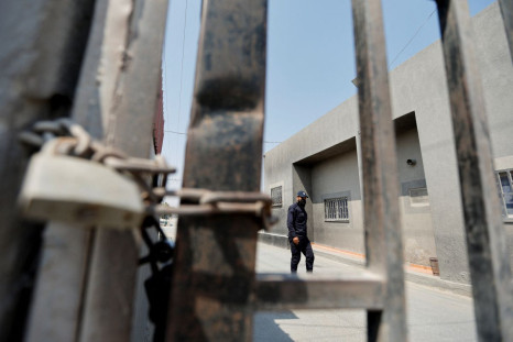 A Palestinian police officer walks at the commercial crossing of Kerem Shalom which has been shutdown by Israel since Tuesday, in the southern Gaza Strip August 4, 2022. 