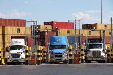 Trucks loaded with shipping containers leave the Port of Montreal in Montreal, Quebec, Canada, May 17, 2021.  