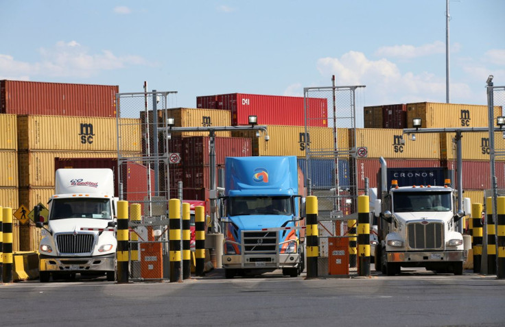 Trucks loaded with shipping containers leave the Port of Montreal in Montreal, Quebec, Canada, May 17, 2021.  