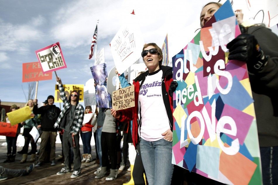 Students from Park City High School hold signs across from members of the Westboro Baptist Church protesting the upcoming premiere of quotRed Statequot during the Sundance Film Festival in Park City