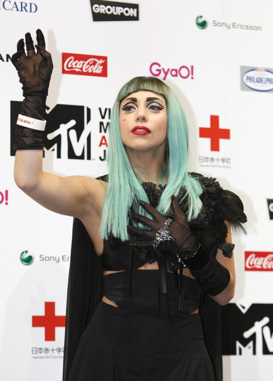Lady Gaga attends MTV Music Aid Japan promotes tourism industry PHOTOS.