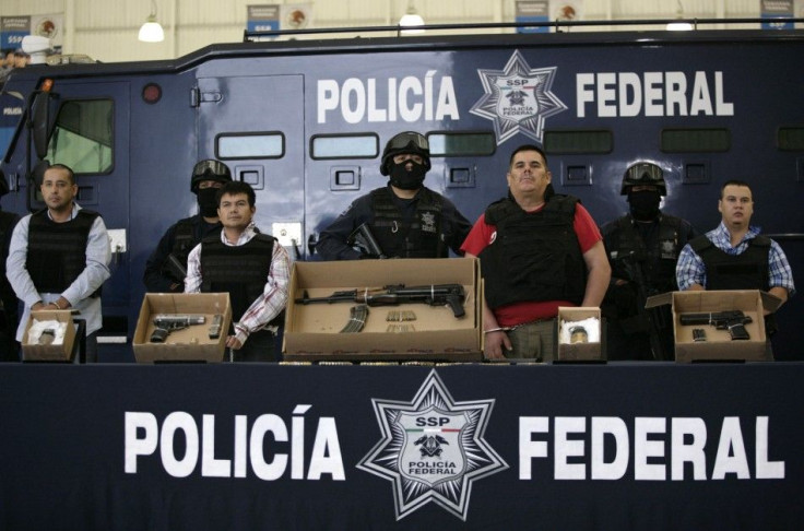 Suspect Jose de Jesus Mendez (2nd R), known by his nickname "El Chango," or "The Monkey", is being presented to the media by the police along with other suspects in Mexico City June 22, 2011.