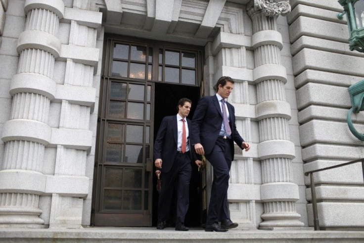 Cameron and Tyler Winklevoss leave the 9th Circuit Court of Appeals after a hearing on a settlement dispute with Facebook in San Francisco