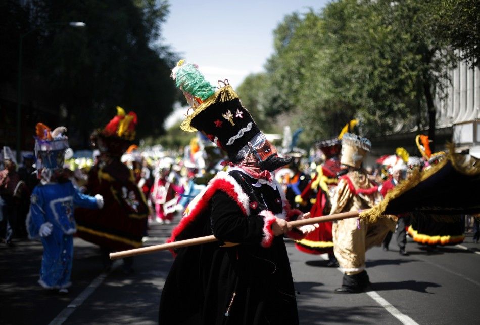 Unique visuals of Corpus Christi Devil Dancers during festive processions.