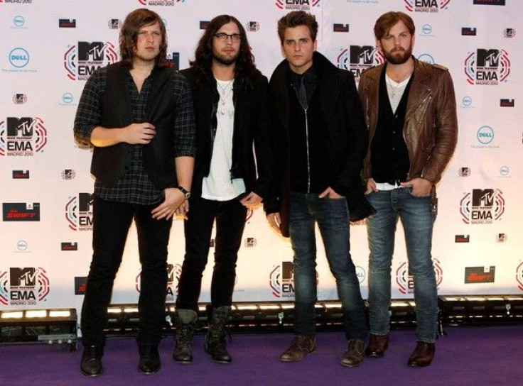 Kings of Leon pose for photographers as they arrive for the MTV Europe Music Awards 2010 in Madrid