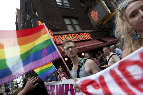 Protesters take part in a demonstration supporting same-sex marriages outside Sheraton Hotel where U.S. President Obama was attending a function in New York.