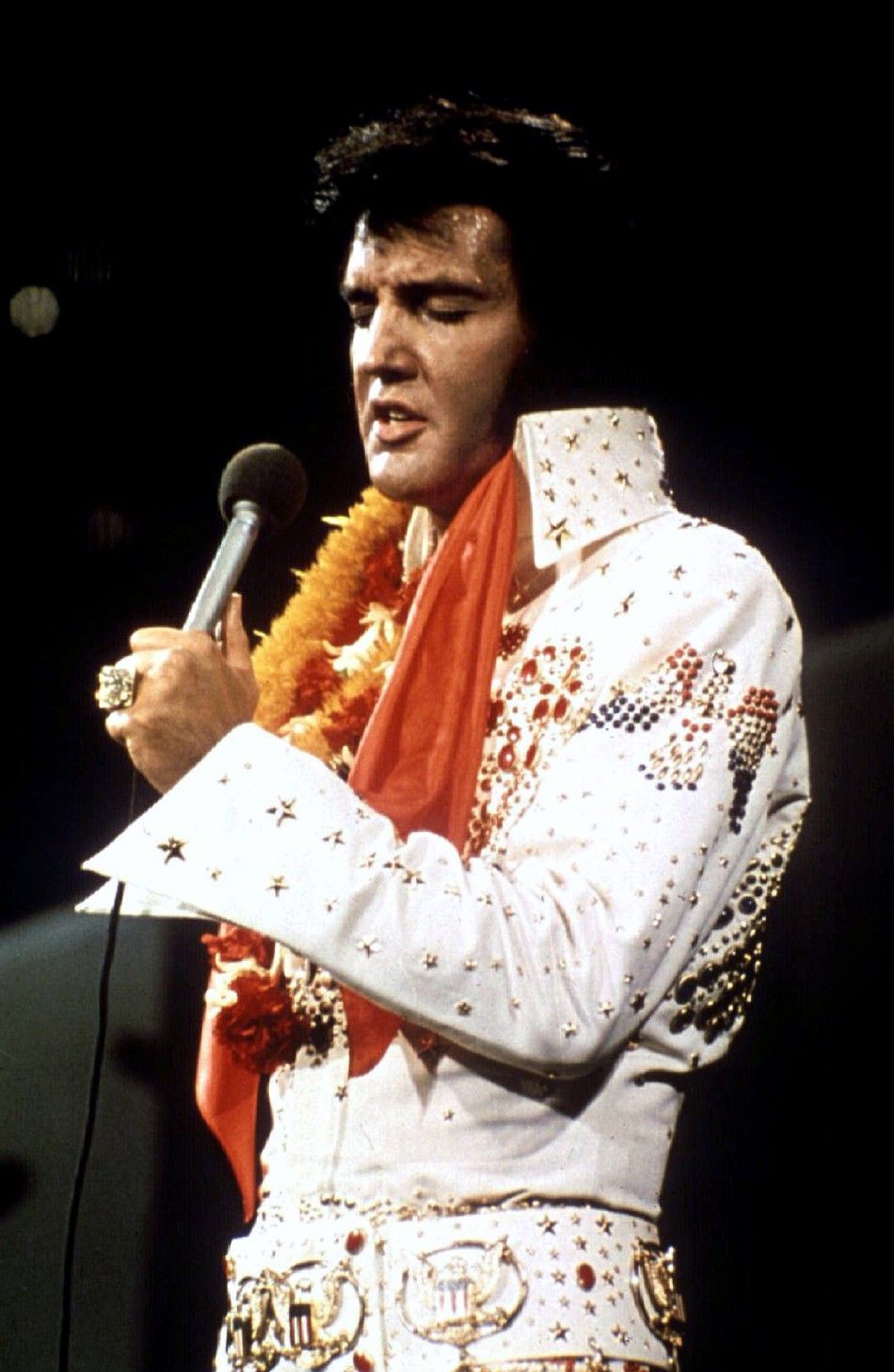 FILE PHOTO 1972 - Elvis Presley performs in concert during his quotAloha From Hawaiiquot 1972 television s..