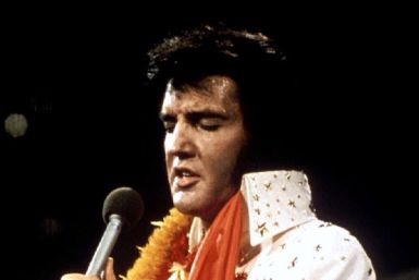 FILE PHOTO 1972 - Elvis Presley performs in concert during his &quot;Aloha From Hawaii&quot; 1972 television s..
