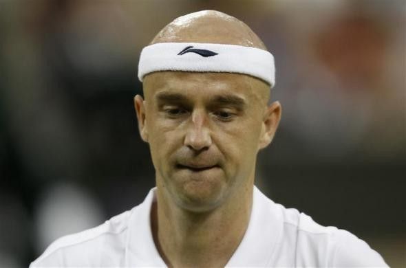 Ivan Ljubicic of Croatia reacts during his match against Andy Murray