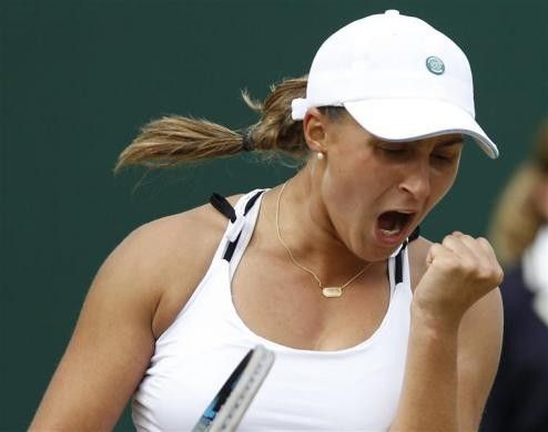 Tamira Paszek of Austria reacts during her match against Francesca Schiavone