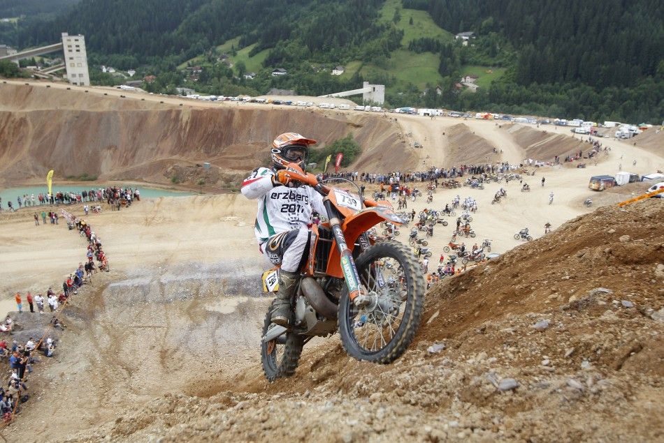A motocross rider participates in the 039Rocket Ride039 race during Erzberg Rodeo near the village of Eisenerz