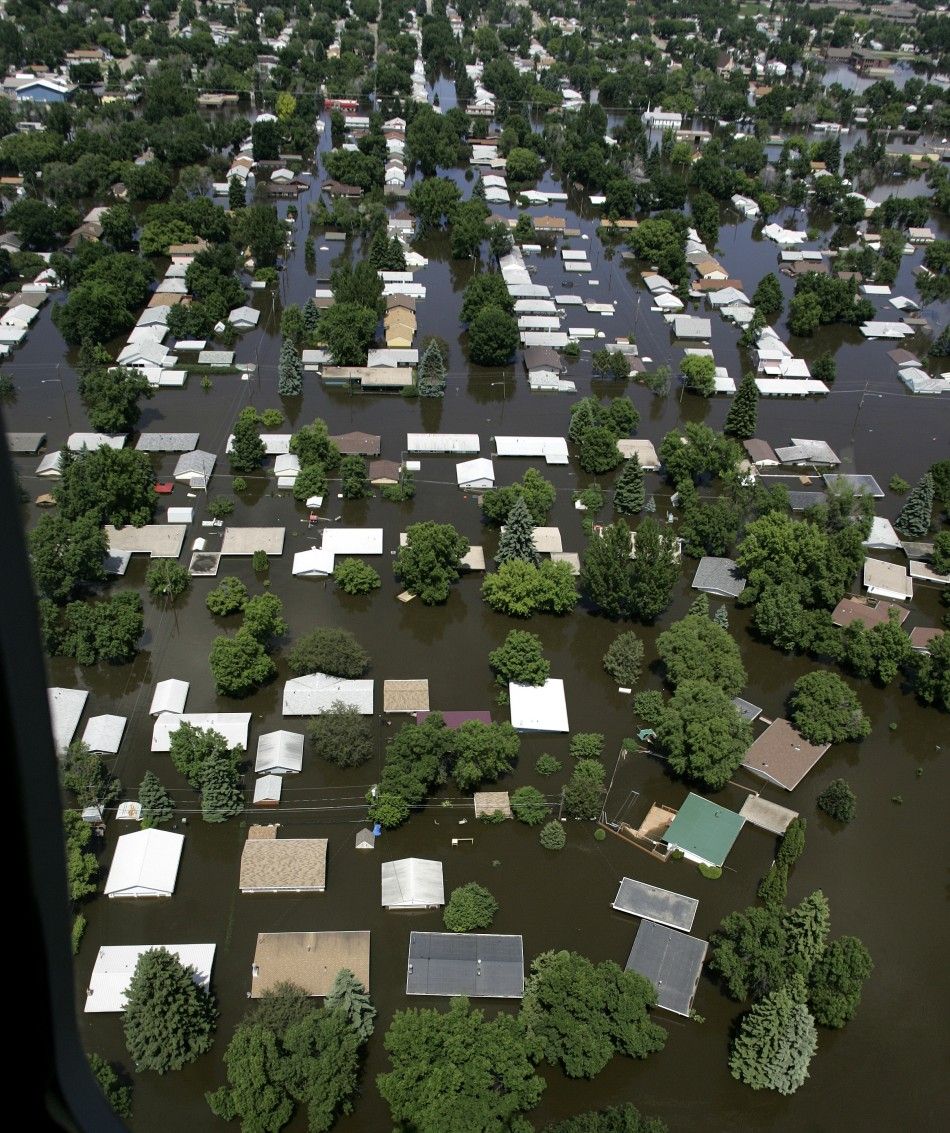 Houses in Minot, North Dakota are seen submerged in flood waters