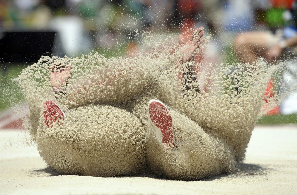 Bryce Lamb lands in the pit during the men039s long jump at the U.S. Outdoor Track and Field Championships