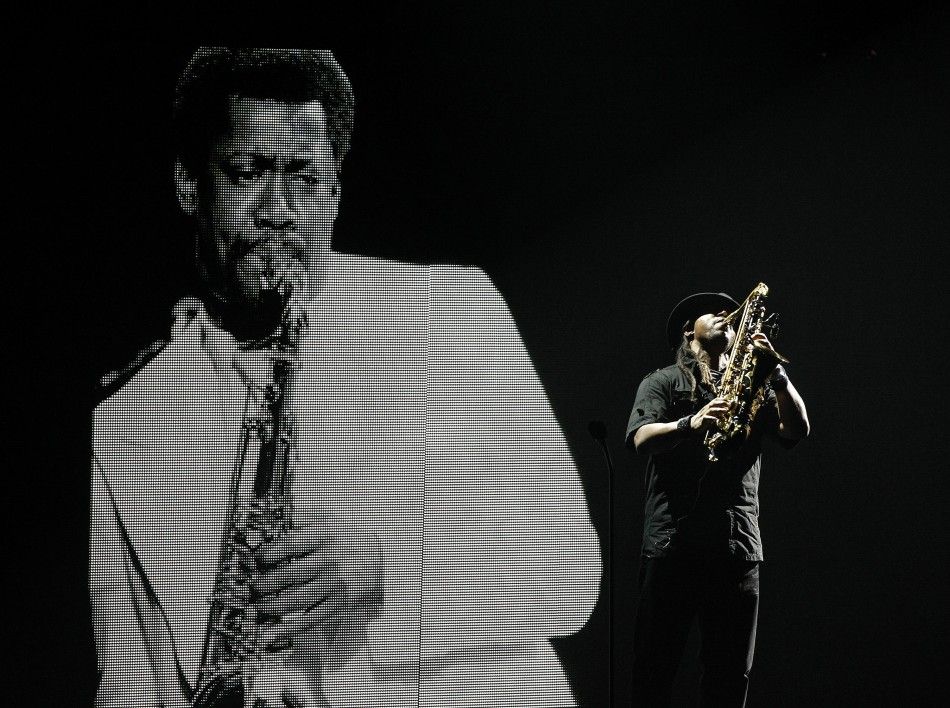 A saxophone player performs in memoriam to Clarence Clemons, the saxophonist in Bruce Springsteen039s band who died recently, at the 2011 BET Awards in Los Angeles June 26, 2011.