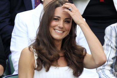 Britain&#039;s Catherine, Duchess of Cambridge sits in the Royal Box on Centre Court for the match between Andy Murray of Britain and Richard Gasquet of France at the Wimbledon tennis championships in London June 27, 2011.
