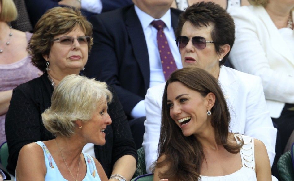 Britain039s Catherine, Duchess of Cambridge R sits in the Royal Box on Centre Court for the match between Andy Murray of Britain and Richard Gasquet of France at the Wimbledon tennis championships in London June 27, 2011.