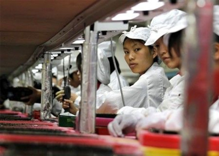 Workers are seen inside a Foxconn factory in the township of Longhua in the southern Guangdong province May 26, 2010