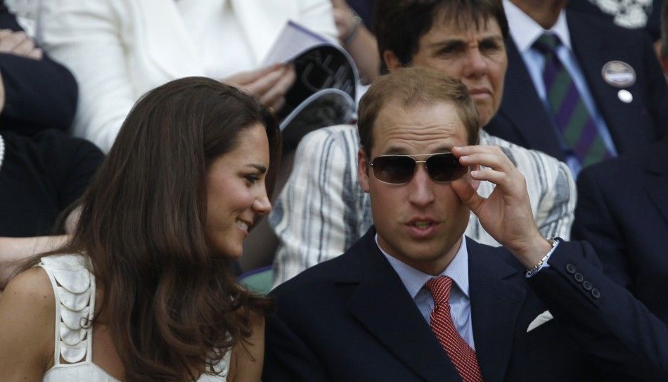 Britains Catherine, Duchess of Cambridge sits with Her Husband Prince William 