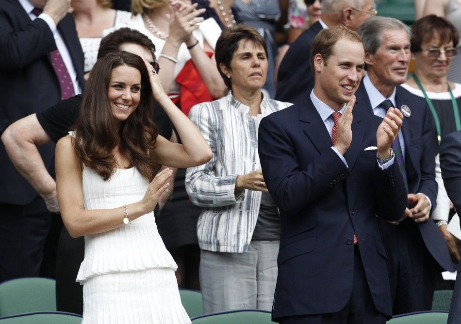Kate and William waving and applauding