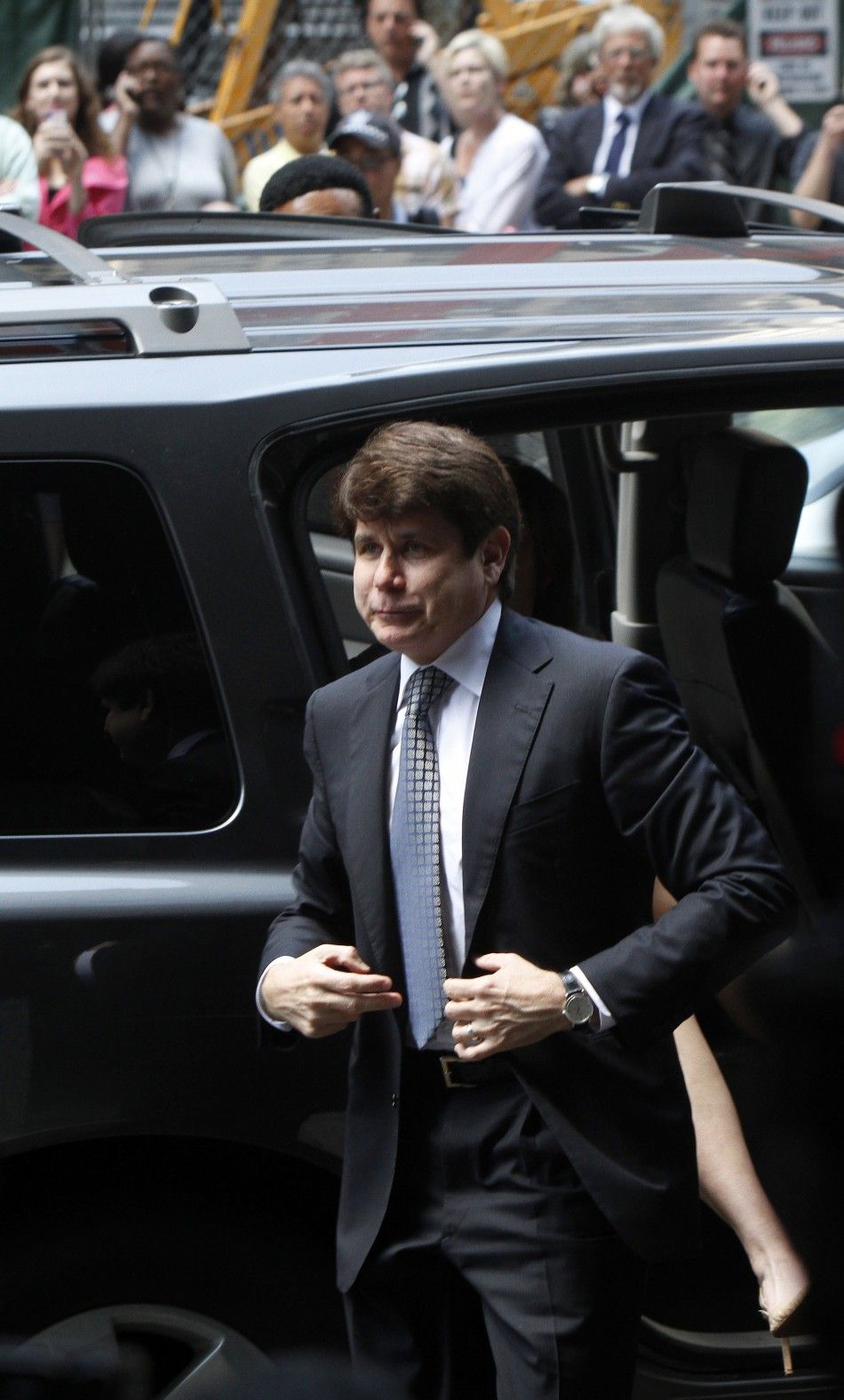Former Illinois Governor Rod Blagojevich exits his vehicle as he prepares to enter the Dirksen Federal building to hear the verdict on his second corruption trial in Chicago