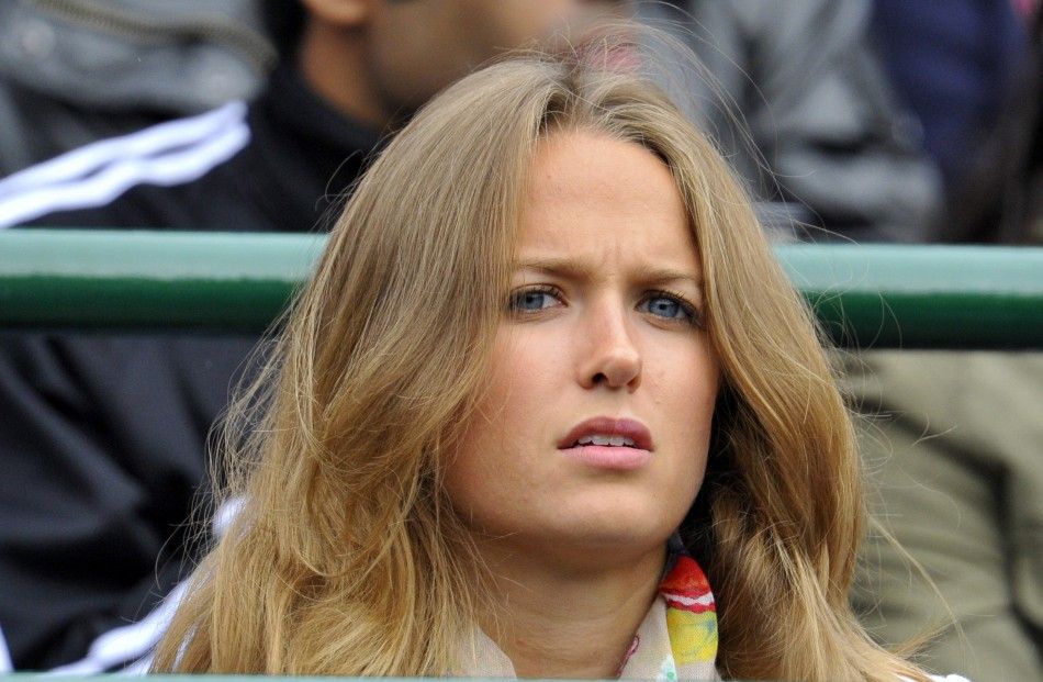 Kim Sears, the girlfriend of Andy Murray of Britain, sits on Court 1 to watch Murray039s match against Tobias Kamke of Germany at the Wimbledon tennis championships in London