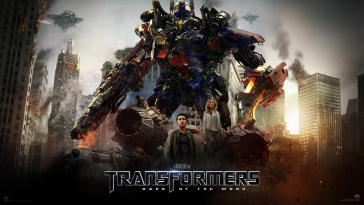 A promotional poster for Transformers: Dark of Moon.
