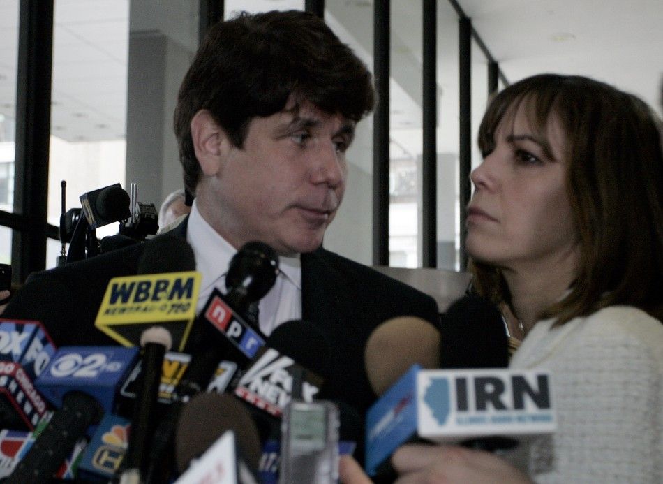 Former Illinois Governor Rod Blagojevich looks at his wife Patti before they leave the Dirksen Federal building after being convicted on 17 of 20 counts in his second corruption trial in Chicago
