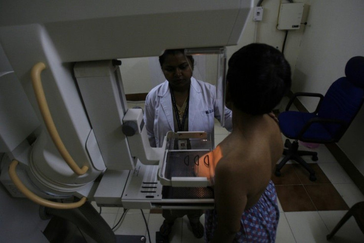 Woman getting a breast exam