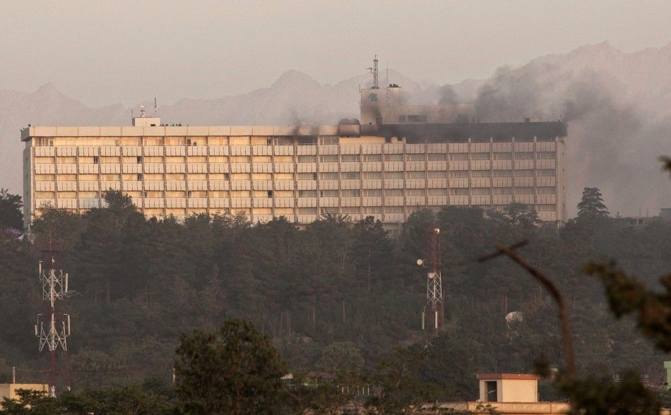 Smoke billows from the Intercontinental hotel during a battle between Afghan security forces and suicide bombers and Taliban insurgents in Kabul