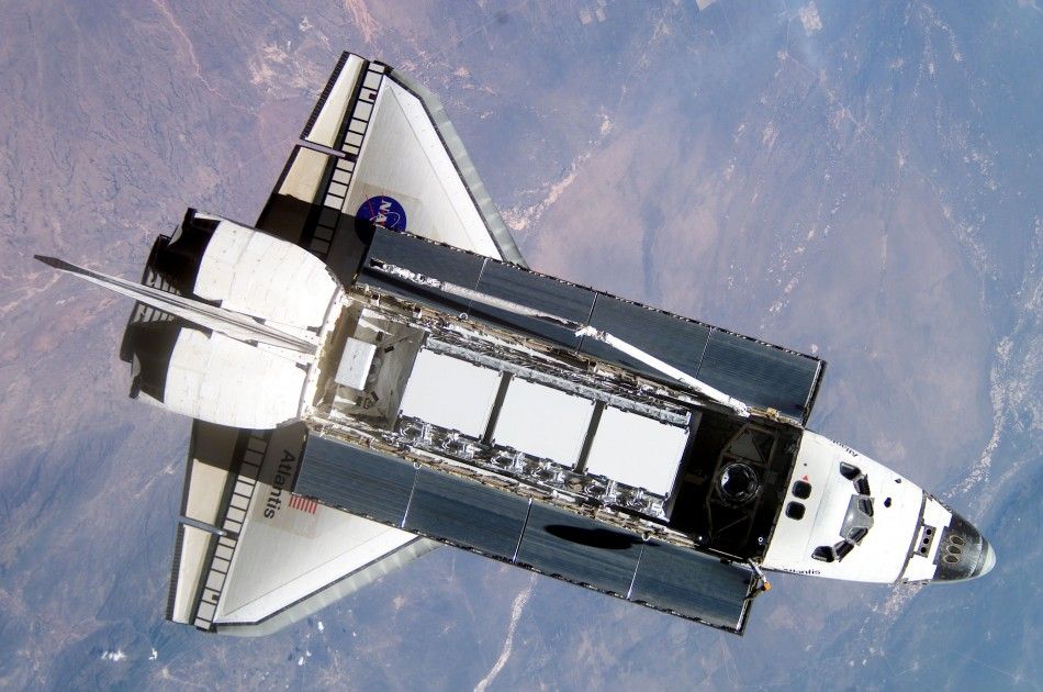 The Space Shuttle Atlantis is seen from the International Space Station ISS during rendezvous and docking operations in this NASA handout photo dated October 9, 2002.