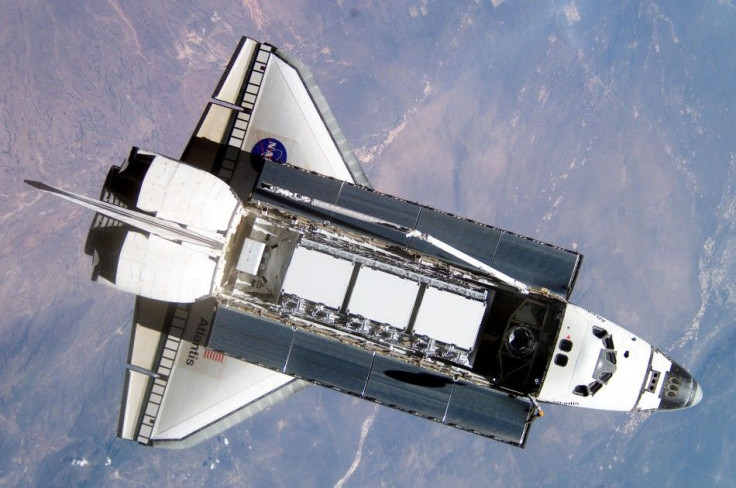 The Space Shuttle Atlantis is seen from the International Space Station (ISS) during rendezvous and docking operations in this NASA handout photo dated October 9, 2002.