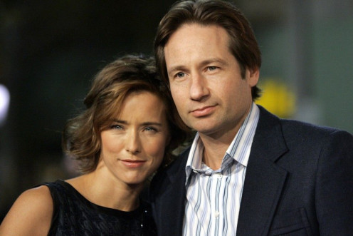 Cast member Tea Leoni and her husband David Duchovny attend the Los Angeles premiere of Columbia pictures&#039; &quot;Fun with Dick and Jane&quot; at the Mann Village theatre in Los Angeles December 14, 2005.