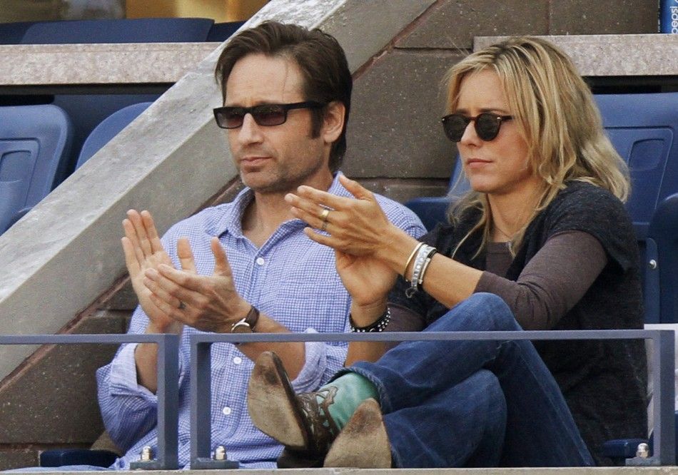 Actors David Duchovny and Tea Leoni applaud during the match between Rafael Nadal of Spain and Novak Djokovic of Serbia during the men039s final at the U.S. Open tennis tournament in New York September 13, 2010.