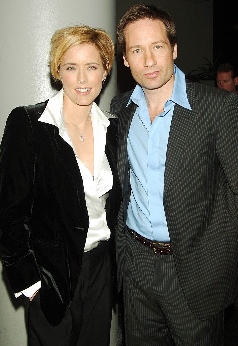 Actors David Duchovny and Tea Leoni pose for photographers during the premiere of their film quotHouse of Dquot in New York April 10, 2005.