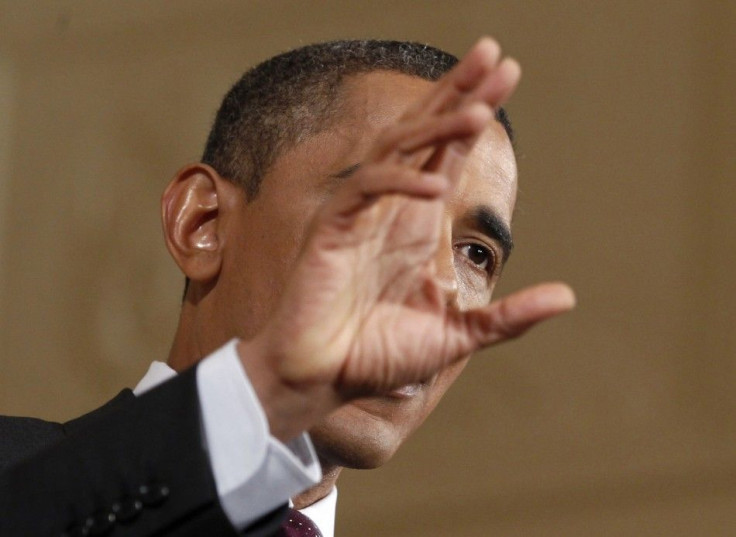 Obama speaks during a news conference in the East Room of the White House in Washington