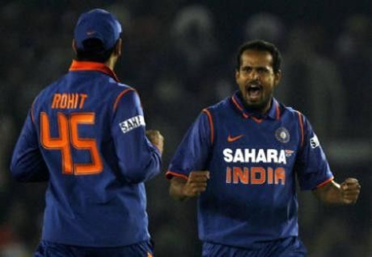 Yusuf Pathan (R) celebrates with teammate Rohit Sharma during a Twenty20 cricket match against Sri Lanka in Mohali in this December 12, 2009 file photo. The Board of Control for Cricket in India (BCCI) will not send a team to this year's Asian Games in Ch