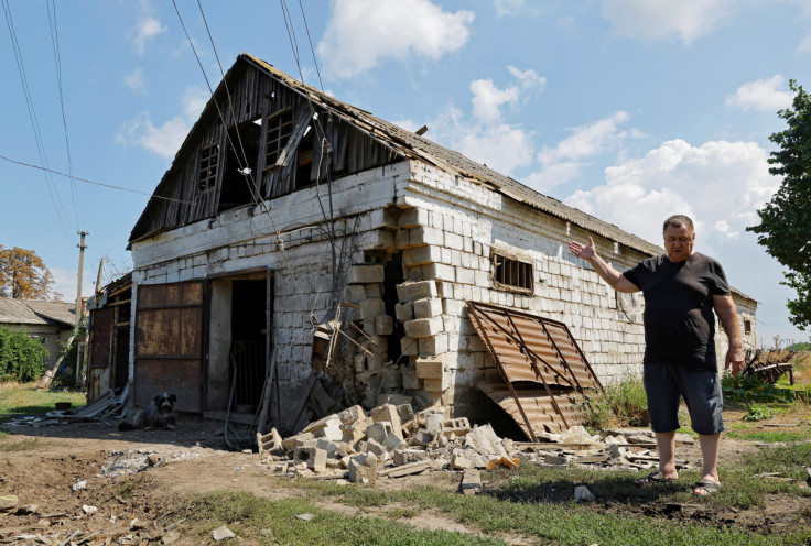 A local farmer shows his farm building damaged during Ukraine-Russia conflict in the Zaporizhzhia region