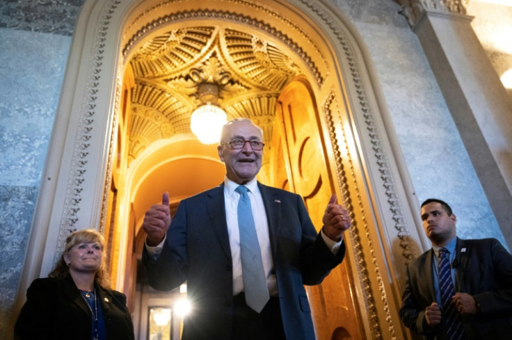 Senate Majority Leader Chuck Schumer gives the thumbs up after the passage of the Inflation Reduction Act on August 7, 2022
