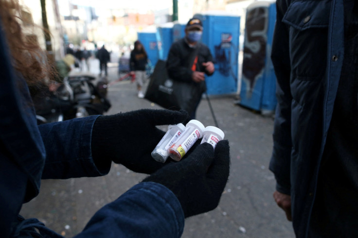 A fentanyl user displays a "safe supply" of opioid alternatives in Vancouver