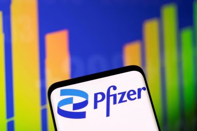 Illustration shows Pfizer logo and stock graph
