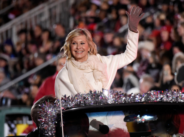 Olivia Newton-John rides in the 85th annual Hollywood Christmas Parade in Los Angeles