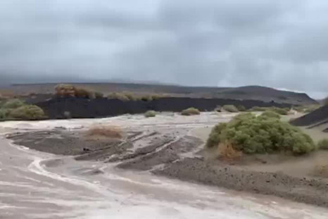 Watch: Water Streams Across Highway Near Death Valley During Flash Flooding