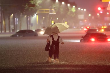 At least seven people were killed and another seven missing after a night of massive rainfall in Seoul