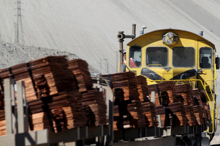 A train loaded with copper cathodes travels along a rail line inside the Chuquicamata copper mine, which is owned by Chile's state-run copper producer Codelco